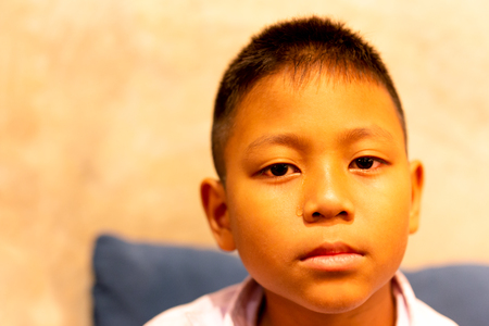 Portrait of asian boy crying with tear on his face.の写真素材