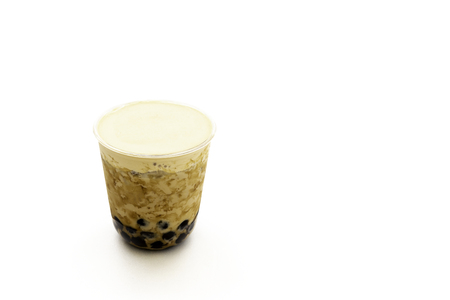 Pearl milk tea with cream on top isolated in clipping path.の写真素材