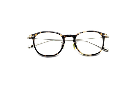 Modern eye glasses isolated on white background.の写真素材