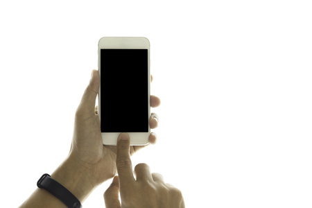 Hand using cell phone isolated in clipping path.の写真素材