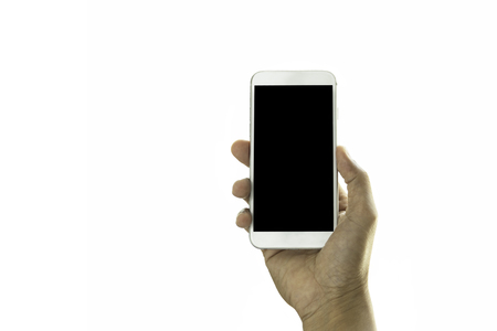 Hand holding cell phone isolated on whiteの写真素材