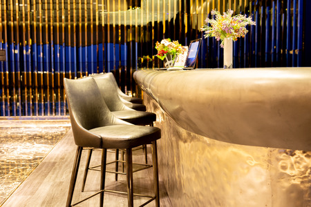 Interior design row of modern leather stools chair in luxury lounge.の写真素材