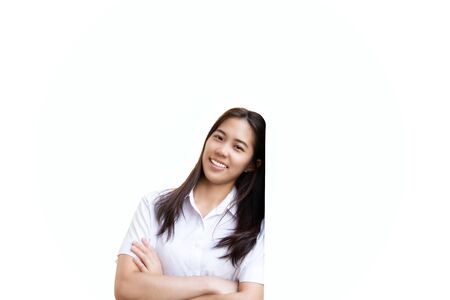 Teenage woman studen with crossed hands smiling isolated.の写真素材