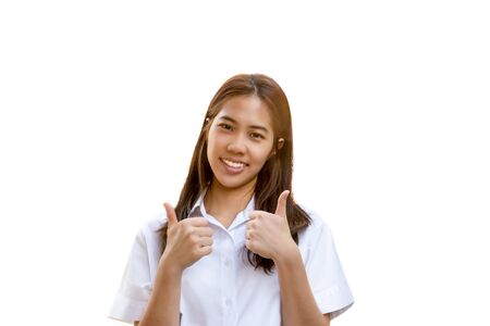 Portrait of smiling student university uniform with thumb up isolated.の写真素材