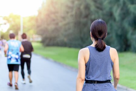 Woman exercise walking in the park in the morning.の写真素材