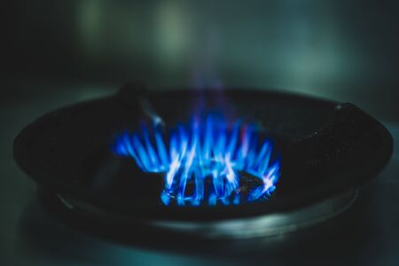 Blue gas flames on gas stove for cooking food.の写真素材