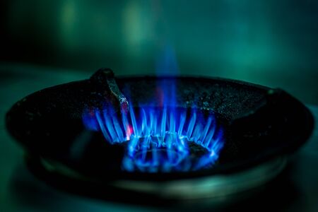 Blue gas flames on gas stove for cooking food.の写真素材