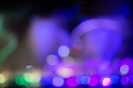 Fountain show with multicolor bokeh color light illumination abstract.の写真素材