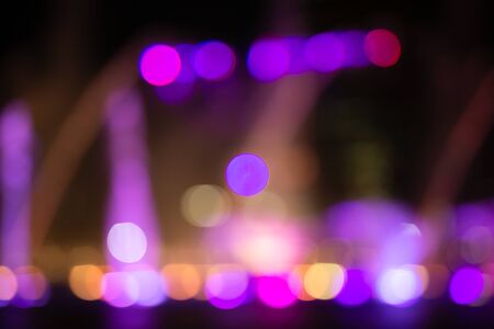 Fountain show with multicolor bokeh color light illumination abstract.の写真素材