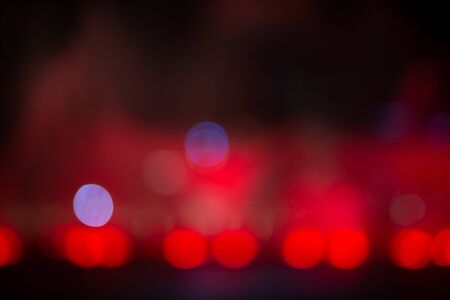 Fountain show with red bokeh color light illumination abstract.の写真素材