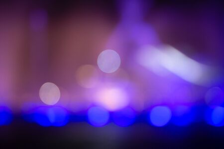 Fountain show with blue bokeh color illumination abstract light.の写真素材