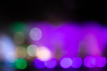 Fountain show with multicolor bokeh color light illumination abstract.の写真素材