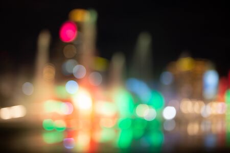 Fountain show with multicolor bokeh color light illumination abstract.の写真素材