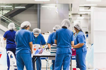 Group of health team preparing vaccine against  in hospital.の写真素材