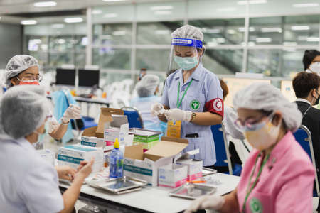 June 7th, 2021- At Bang Sue Grand Station Bangkok Thailand : Group of health team preparing vaccine against covid-19.のeditorial素材