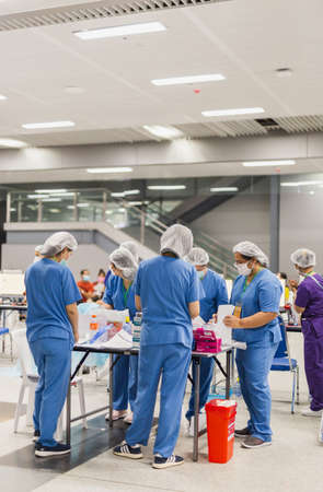 June 7th, 2021- At Bang Sue Grand Station Bangkok Thailand : Group of health team preparing vaccine against covid-19.のeditorial素材