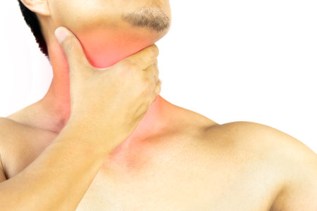 Man feeling painful in the throat isolated in clipping path. red dot