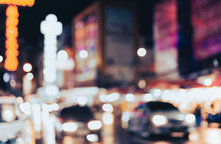 Defocused photo of vehicle lights in traffic at night in city.の写真素材