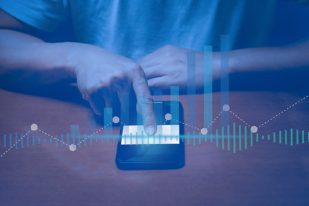 Man touching cell phone with digital business hologram graph finance chart.