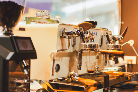 Coffee machine making double espresso shot in cafe