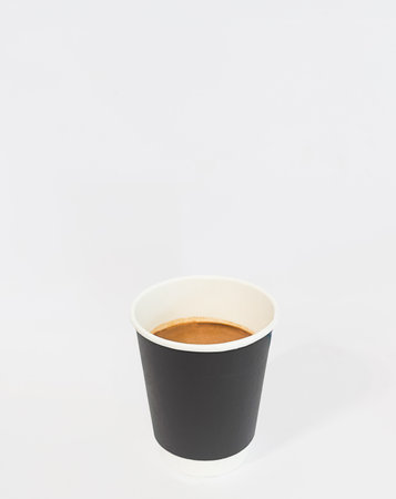 Americano coffee in black paper cup isolated on white backgroundの写真素材