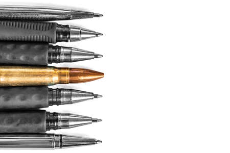 Bullet and pens on white background. Freedom of the press is at risk concept. World press freedom day concept.の写真素材