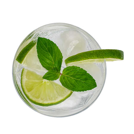 Glass of the Mojito cocktail with lime and mint isolated on white background. Top view.の写真素材