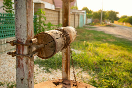 Old wooden water well of in the Ukrainian countryside.の写真素材