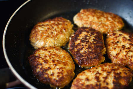 fried cutlets on a frying pan.の写真素材