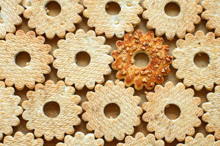 cookies with nuts in the form of the gears for background. Close-up, top View.の写真素材
