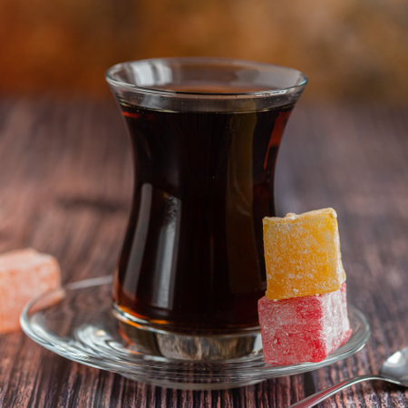 Turkish black tea in traditional tea glass. Close up.の写真素材
