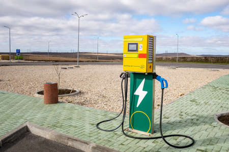 Front view of an electric vehicle charging station in the countryside.の写真素材