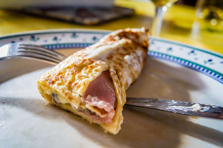 French crepe picarde with ham, mushroom and sauce bechamelの写真素材