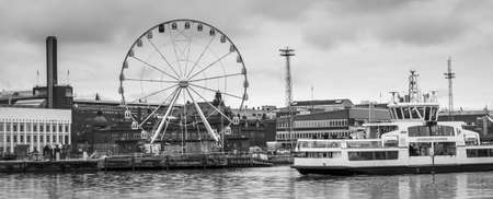 Big wheel and Helsinki harbour in Finland, black and white pictureのeditorial素材