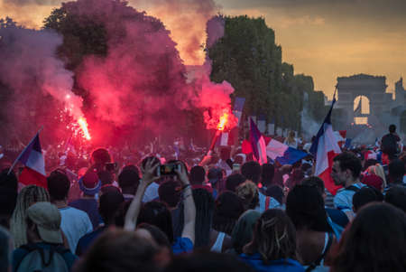 People celebrating victory on the Champs Elysees Avenue in Paris after the 2018 World Cupのeditorial素材