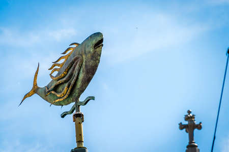 Fish Weathervane and blue sky in Melbourne, Victoria, Australiaの写真素材