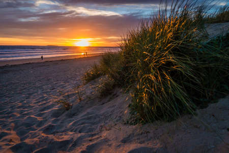 Sunset in Sainte Barbe beach in Brittany in Franceの写真素材
