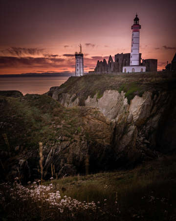 Saint Mathieu lighthouse in Brittany at sunset in Franceの写真素材