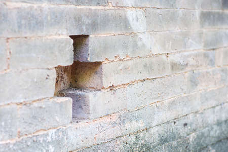 Background of the old white walls with different shades 