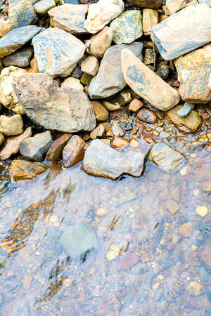Background of water and stoneの写真素材