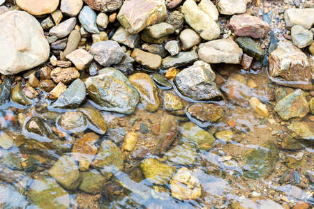 Background of water and stoneの写真素材