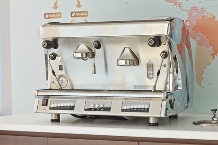Coffee maker machine on table
