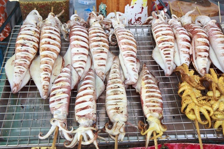 grilled squid in thai market.