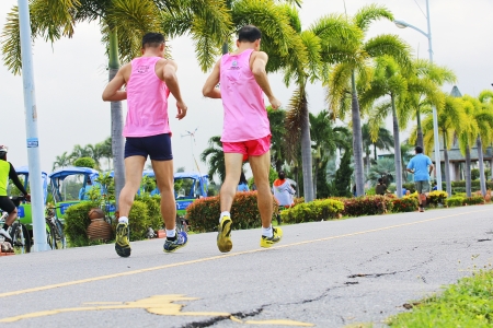 People jogging in  park at eveningのeditorial素材
