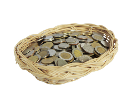 pot of coins isolated on white.の写真素材