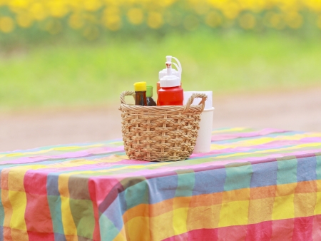 An arrangement of various gourmet condiments in a gift basket.の写真素材