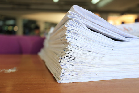 Newspapers folded and stacked concept for global communications.