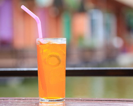 Full glass of fresh iced orange juice.の写真素材