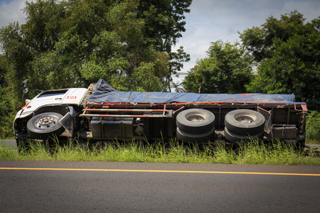overturned truck accident on highway road.の写真素材