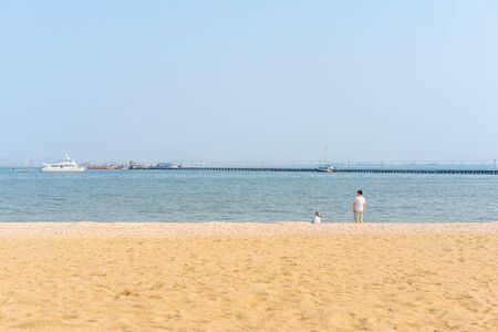 couple on the beach, man and woman.の写真素材